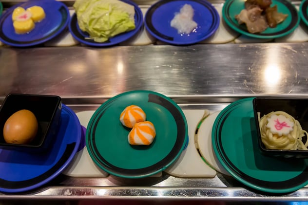 Japan restaurant food conveyor or belt buffet. belt sushi in japan